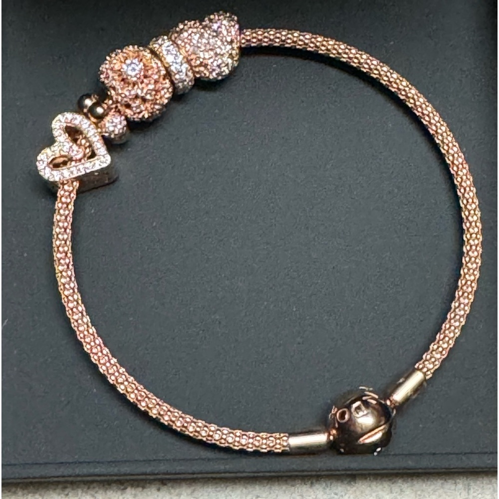 Authentic rose Pandora bracelet and beads